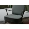 This is actually our Ercol 252 we spray painted it in a light grey