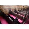 Old pews with new red cushions