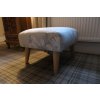 latest re-upholstered footstool