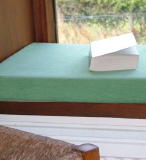 Sit in comfort on this simple oblong shaped window seat cushion.