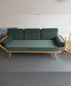 Ercol 355 Studio Couch in Ross Fabrics Pimlico Ocean with bolsters, and piping