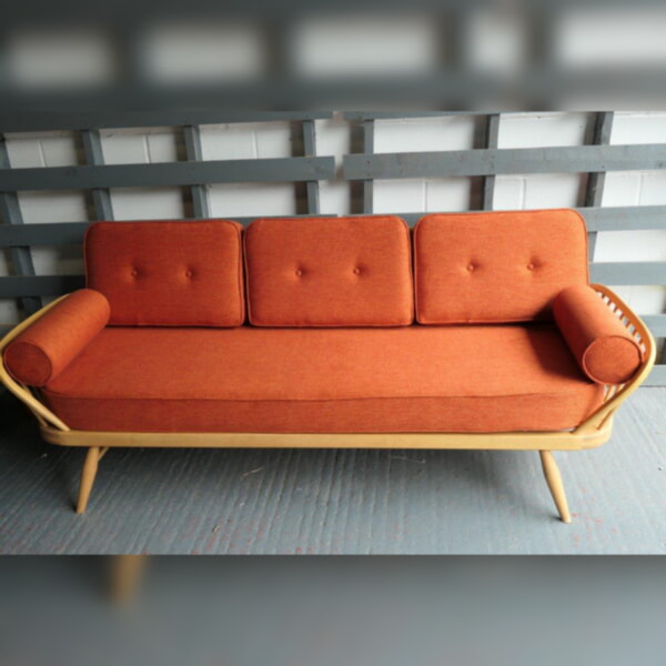 Ercol 355 Studio Couch Two To Tango with bolsters, buttons and piping