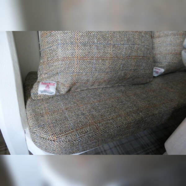 This beautiful Harris Tweed pew cushion and lots of matching scatters.