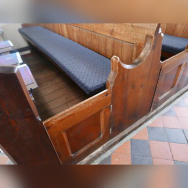 Each old pew has a retaining door.