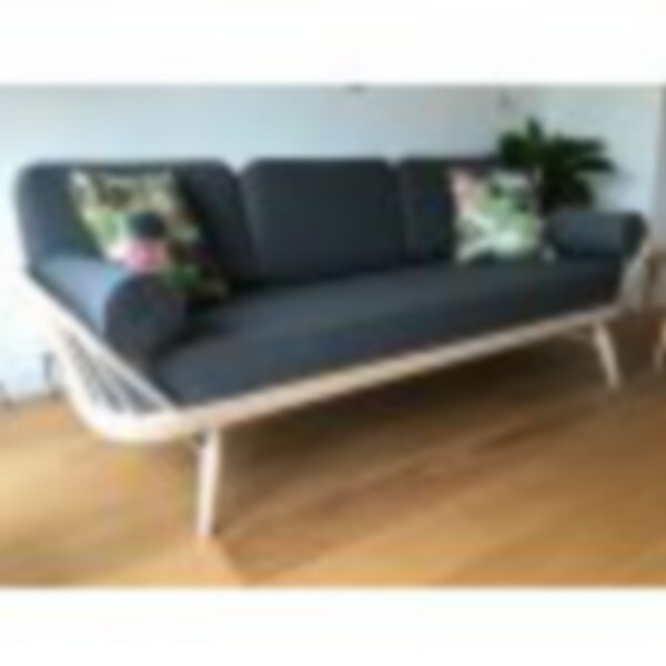 92% wool with light grey piping