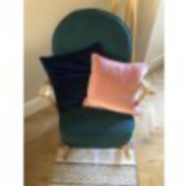 The Ercol Rocking Chair in Ross Fabrics Notting Hill Plain Teal