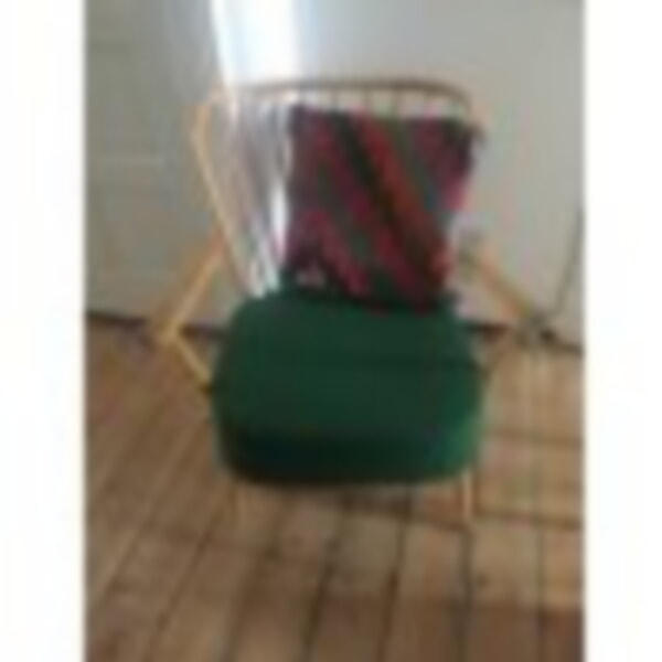 The 477 without the spindle hiding Ercol big bulky back cushion