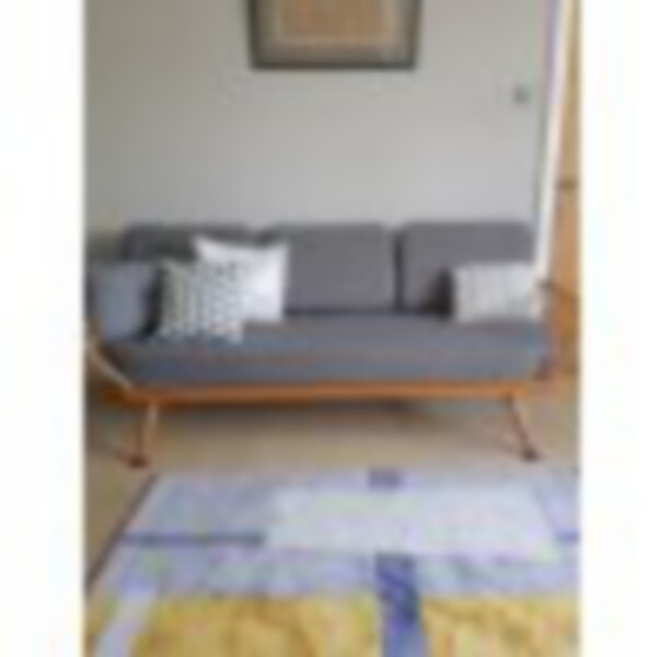 Ercol daybed in a special grey with piping