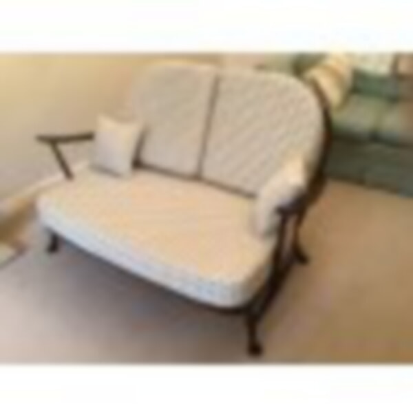 Fabric on the Ercol 203 settee is Cornelia Aqua/Green by Colefax and Fowler from Norfolk Upholstery.