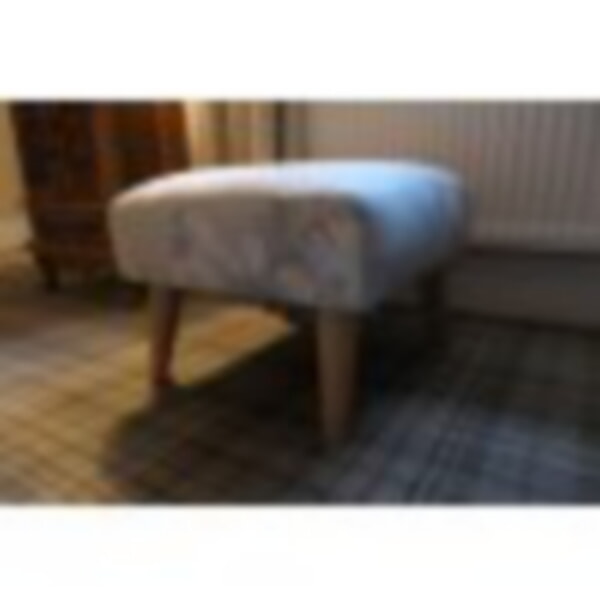 latest re-upholstered footstool
