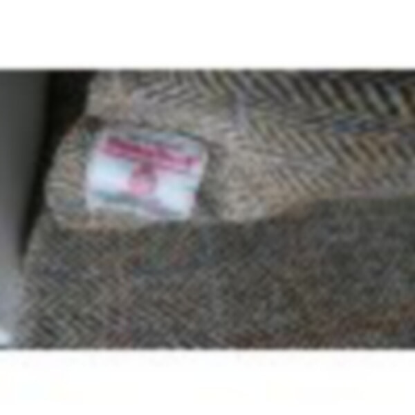 This beautiful Harris Tweed pew cushion and lots of matching scatters.